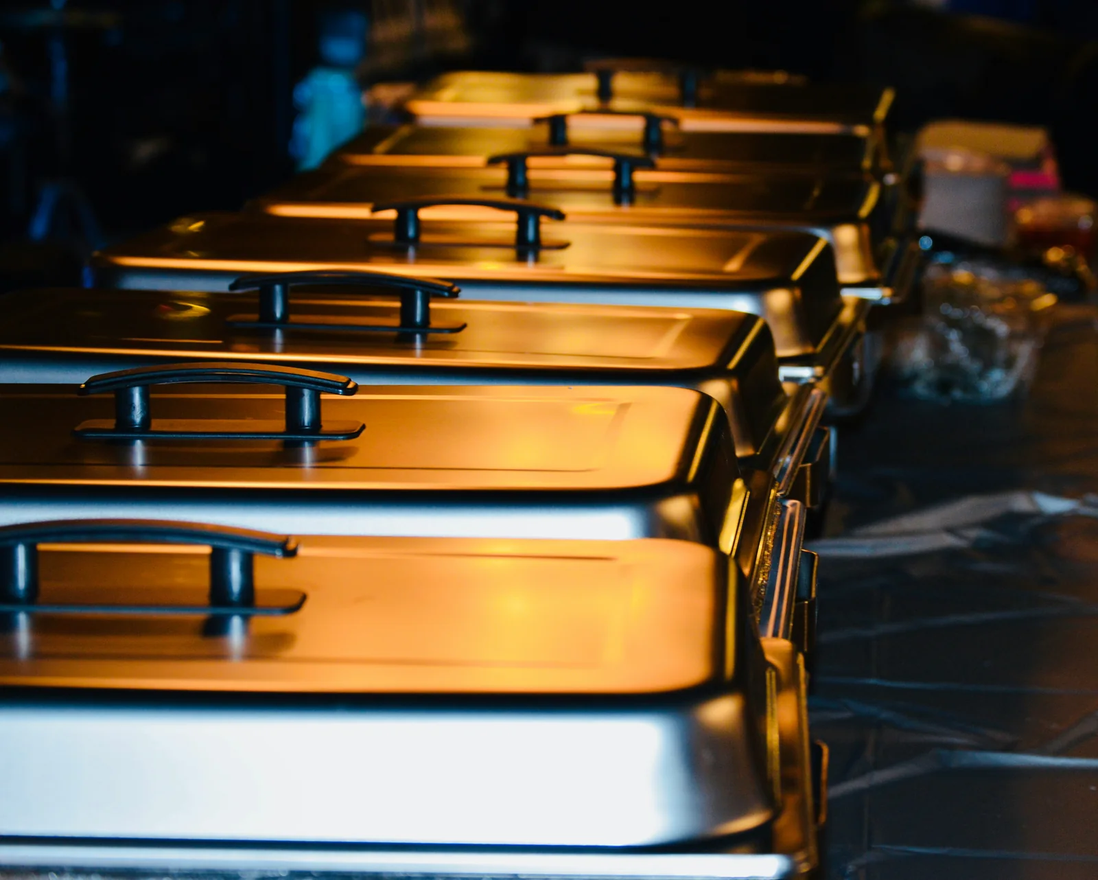 Chafing dishes lined up and ready to serve